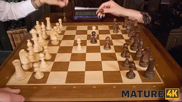 MATURE4K. Charmer in black coaxes boy to bang her after the chess game