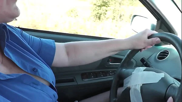 Sexy blonde MILF Frina drives car in stockings without panties under skirt. Auto navigator is broken. Sexy milf asked random passerby for further directions. No panties in public. No panties under skirt. Naked in public. Big natural tits Milf. Mini skirt