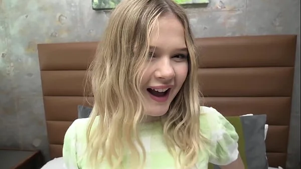 This stunning 18 yr old has tan lines and a trimmed pussy