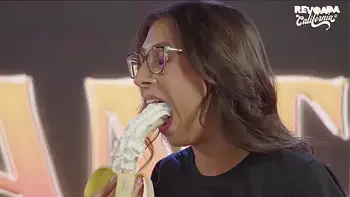Hot girls, with a banana in their mouths, in a sucking challenge, who has the deepest throat?