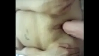 husband gives wife pearl necklace