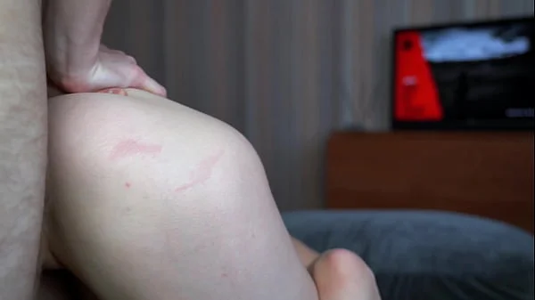 I play with my stepsister's tight pussy while she plays console