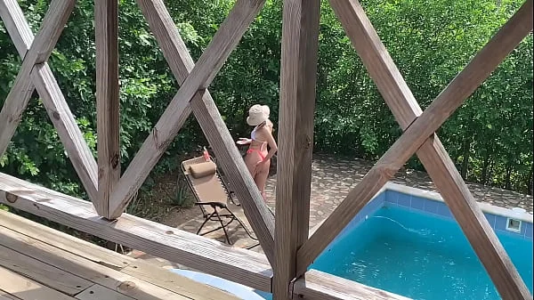 While my wife is tanning in the pool, my sister-in-law fucks me on the balcony