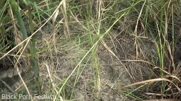 Skinny African tribe woman working outdoor