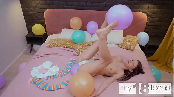 MY18TEENS - Skinny girl with small tits blows up balloons and fucks herself with a dildo