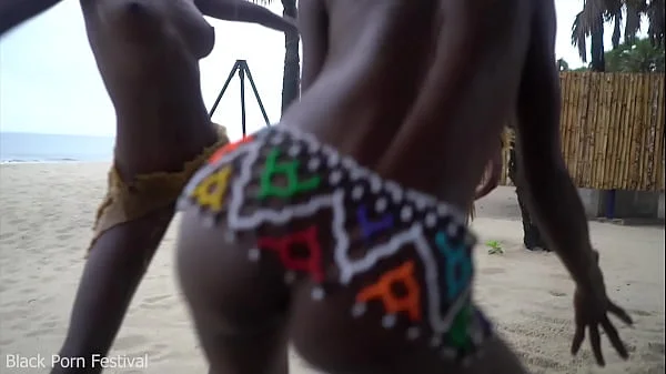 3 African tribe witches doing a dancing ritual for making rain