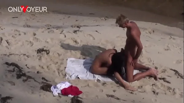 Beach Voyeur. Perfectly shaped teen having sex on a public beach
