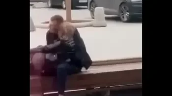 Stupid blonde gives blowjob in public
