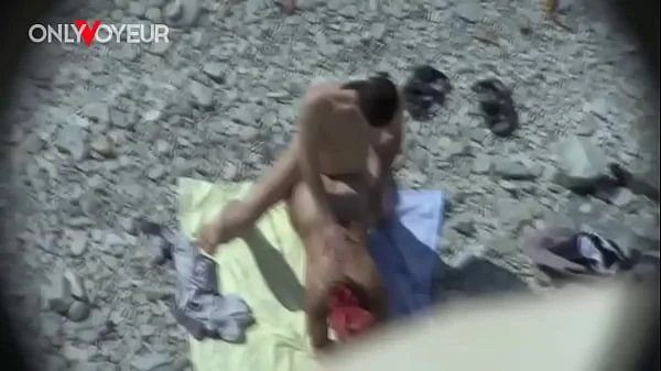 Beach Voyeur. Curvy MILF gives head and get it from behind in public