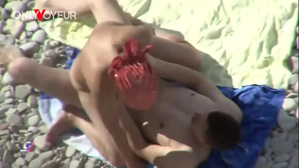 Beach Voyeur. Curvy MILF gives head and get it from behind in public