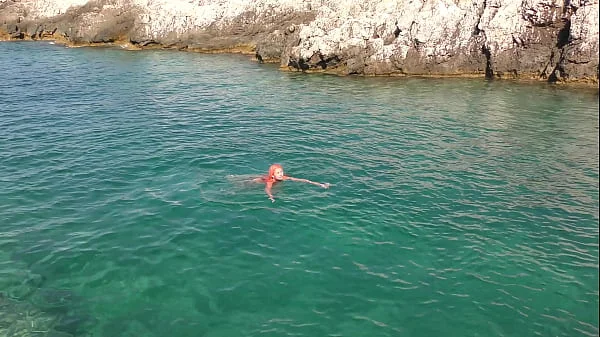 Blue water and a naked girl!