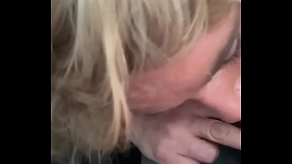 Real hooker gives head in the backseat of a car & lets him cum in her mouth