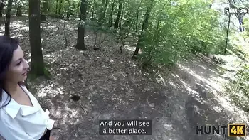HUNT4K. Humiliating her boyfriend while sucking a huge biker’s cock in the forest