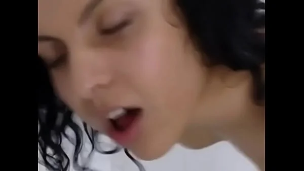 Hairy brunette gets fucked in the shower