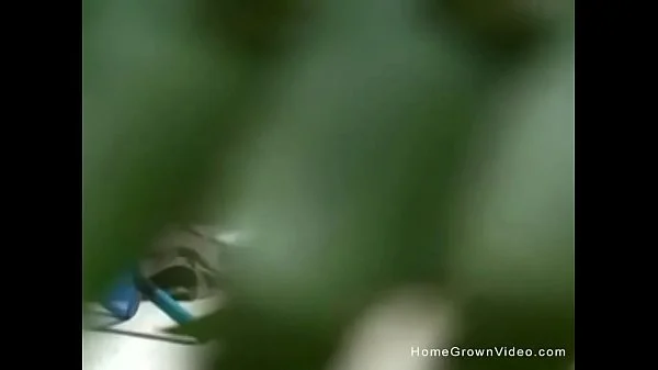 Big tit girlfriend giving a handjob outside by the pool