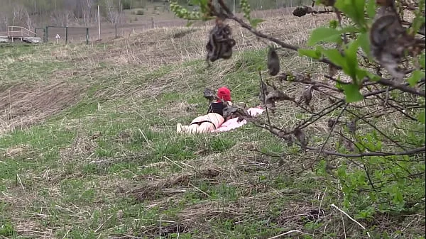 Voyeur spies on a girl with a big ass that masturbates outdoors. Organic masturbation with cucumber.