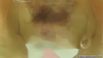 Misty Lovelace in a micro bikini and her fluffy hairy bush