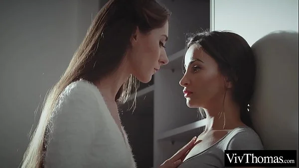 Lesbian brunettes explore each others shaved pussies