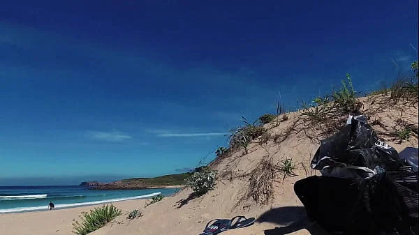 PISS PISS TRAVEL - Russian nudist girl Sasha Bikeyeva pissing on a public beach Doninos on Galicia Spain