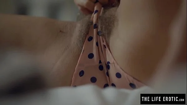 Puffy nippled milf masturbating at home through her wet panties