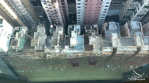 NAUGHTY DESI GIRL RIDES DILDO AGAINST HONG KONG SKYSCRAPER WINDOW