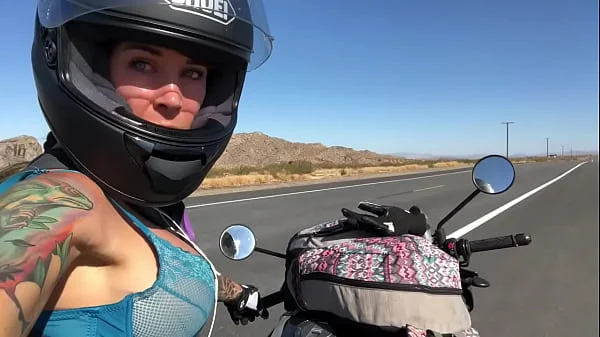 felicity feline riding on aprilia tuono motorcycle
