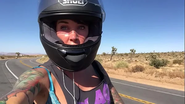 felicity feline riding on aprilia tuono motorcycle