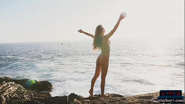 Two gorgeous MILF babes stripteasing and posing nude