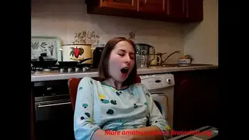 Teenie fingers to orgasm in kitchen