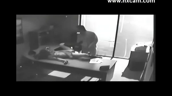 Security camera Films Sex At Office On Desk