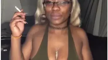 Smoking Milf Teases With Big Tits