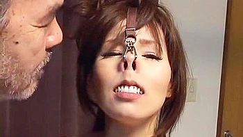 She is naked, her nostrils are lifted and her nipples are pinched.