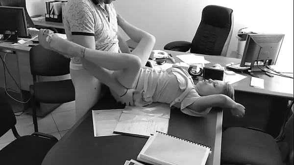 The boss fucks his tiny secretary on the office table and films it on hidden camera