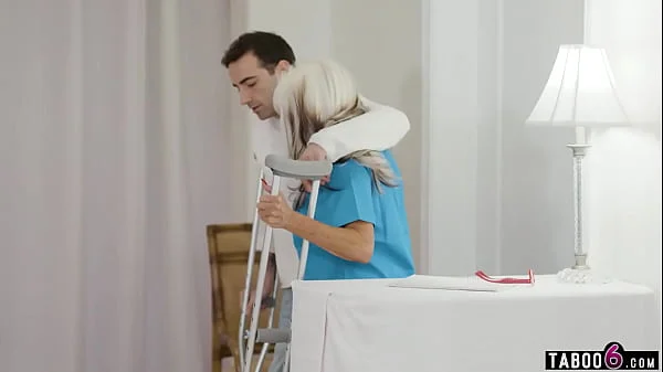 Granny physical therapist Sally DAngelo treats a young handsome client