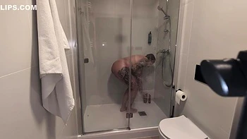 The Girl With Big Tits Takes A Shower And Masturbates