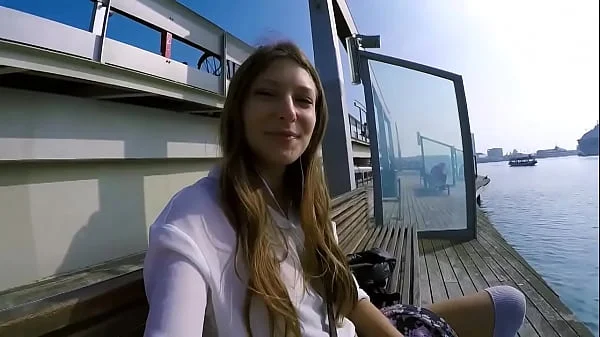 Talia Mint plays in public with remote control toy over the phone with fan