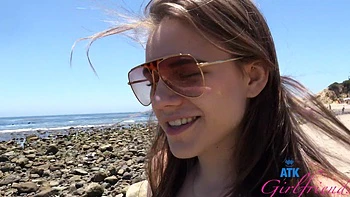 A young couple has sex in the car on a beach, Rose Caarter is driving.