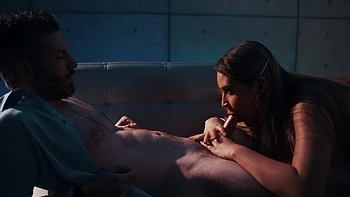 A guy is having fun with a girl on the sofa, exploring new thrills.