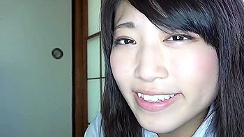 While using a vibrator, she inserts and removes a dildo and gives a blowjob, taking the penis in her mouth.