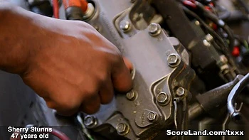 Sherry Stunns works on Jax's piston - Sherry Stunns and Jax Black - Scoreland2