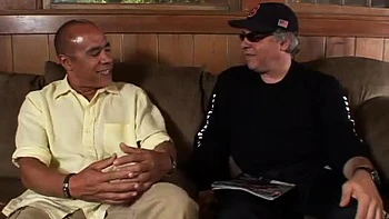 The big titted model lets an old guy use her body