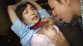 For some reason, her buttocks are touched, her lower body is exposed, and she is handcuffed, unable to move.