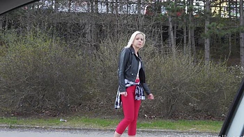 A cute blondie, Julia Parker, licks her shaved pussy with passion.