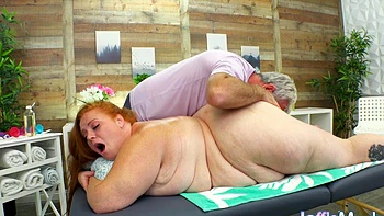Redheaded BBW Julie Ginger Gets Massaged