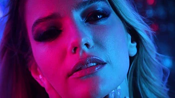 Sexy blonde MILF flaunts wet nude figure