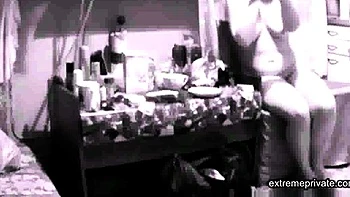 spy cam- naked stepmother puts on make up