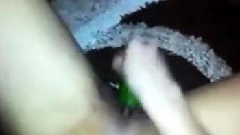 Asian Girl's Solo Fun with a Cucumber