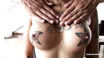 Fake-boobed inked brunette Marly Romero likes this large penis