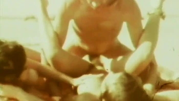 Rene Bond And John Holmes - Hot Threesome On The Beach From The American Vintage Porn Of The Seventies