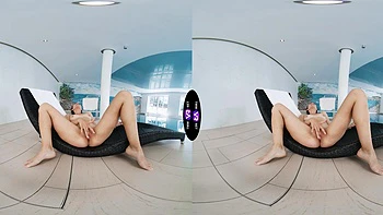 A beautiful brunette, Vixi Rafi, caresses her peachy ass in vr